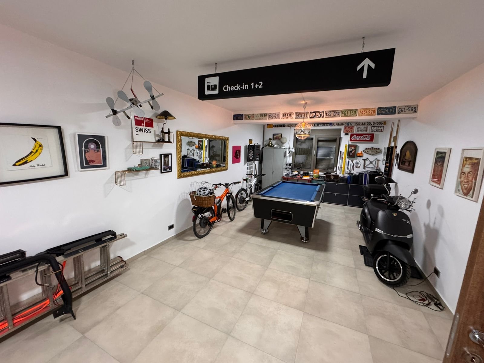 Stylish Ulcinj room with pool table, art, scooter, and d&eacute;cor&mdash;unique Montenegro real estate by Ekosphere on immorenta.me.