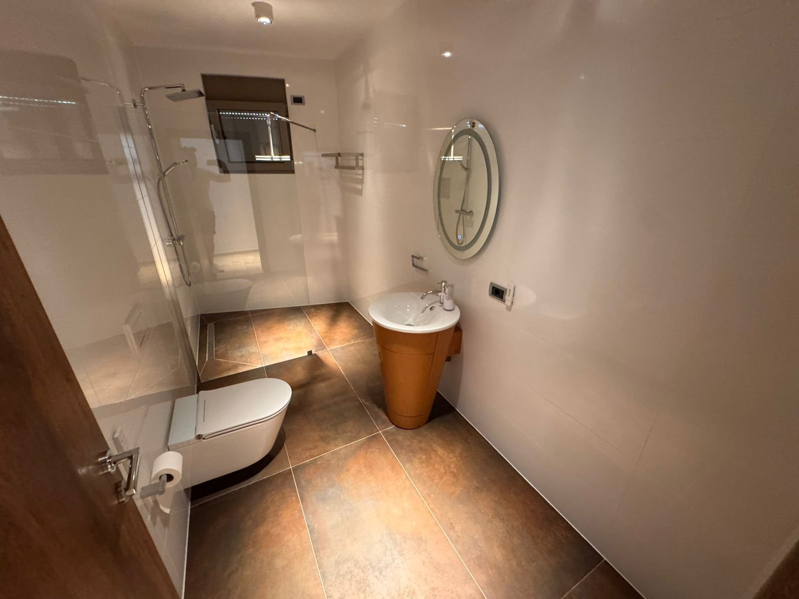 Luxury modern bathroom in Ulcinj by Ekosphere; sleek tiles, premium fixtures&mdash;exclusive listing on immorenta.me.