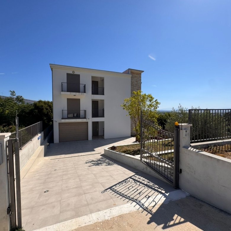 Modern 3-story house with balconies, garage & lush greenery in Ulcinj&mdash;prime investment on immorenta.me by ekosphere doo.