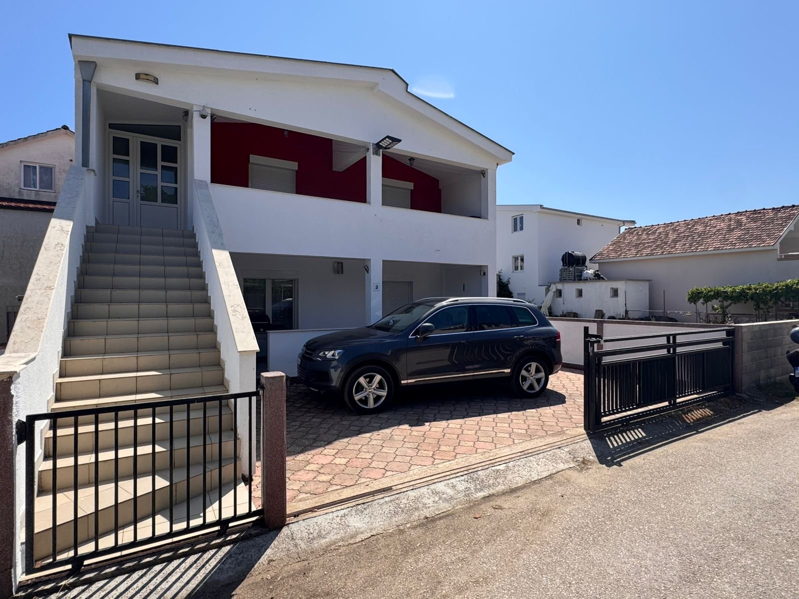 Modern two-story white home in Ulcinj with balcony, paved drive, secure gate&acirc;prime Montenegro investment via immorenta.me/Ekosphere doo.