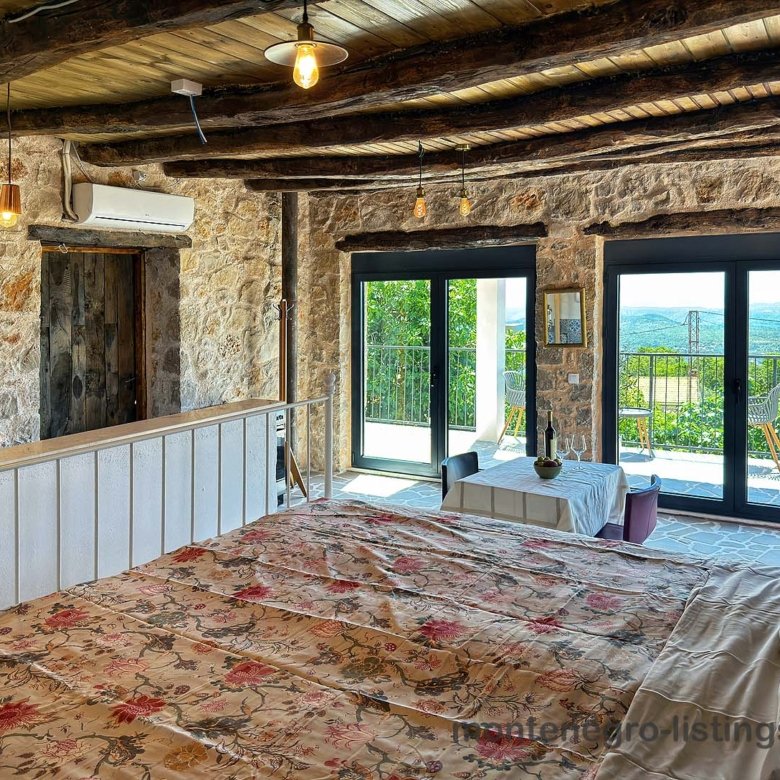 Charming Ulcinj retreat: exposed beams, stone walls, floral d&eacute;cor, patio with hillside views. Invest via immorenta.me by ekosphere doo.