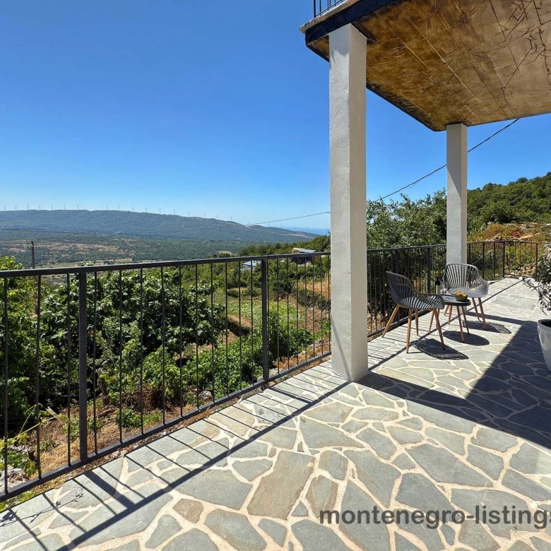Elegant stone patio with metal railing, panoramic Ulcinj valley views&mdash;prime Montenegro real estate by ekosphere doo at immorenta.me.