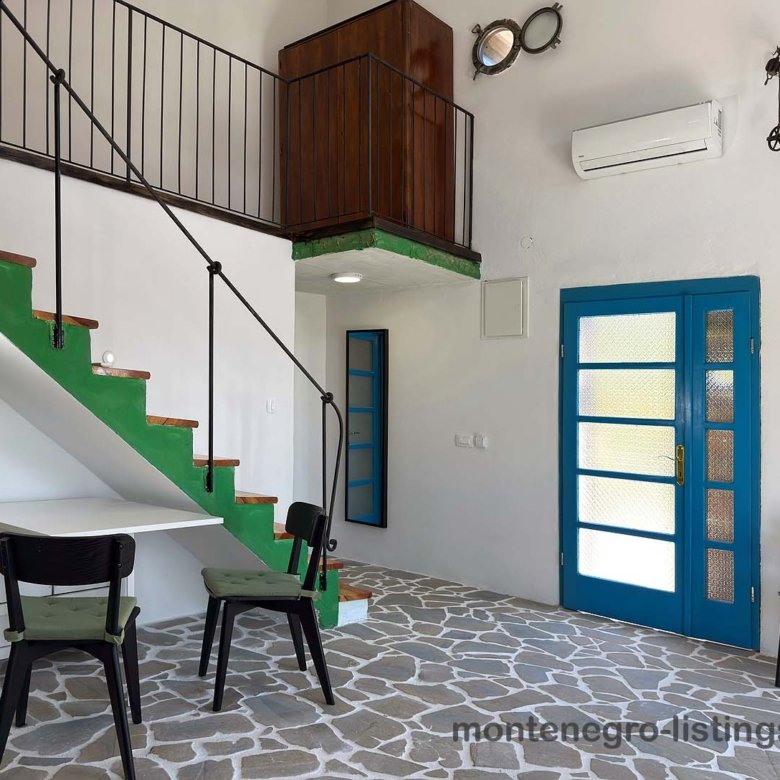 Stunning Ulcinj property: airy interior, modern green-white staircase, stone floors, loft, AC&mdash;listed by ekosphere doo on immorenta.me.