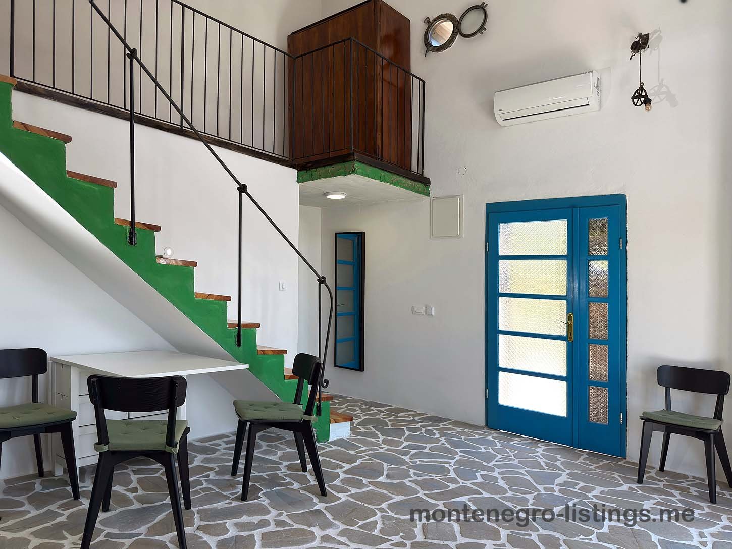 Stunning Ulcinj property: airy interior, modern green-white staircase, stone floors, loft, AC&mdash;listed by ekosphere doo on immorenta.me.