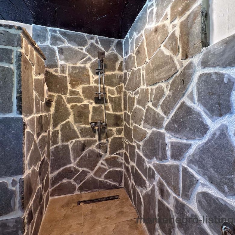 Luxurious Ulcinj shower: stylish stone tiles, rainfall shower, eco washing machine. Exclusive Ekosphere DOO on immorenta.me.