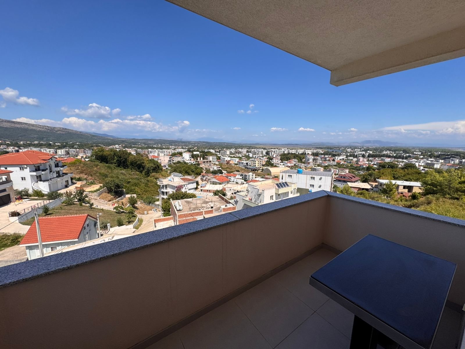 Stunning tiled balcony with panoramic views over Ulcinj real estate, perfect for investors&mdash;immorenta.me by Ekosphere doo.