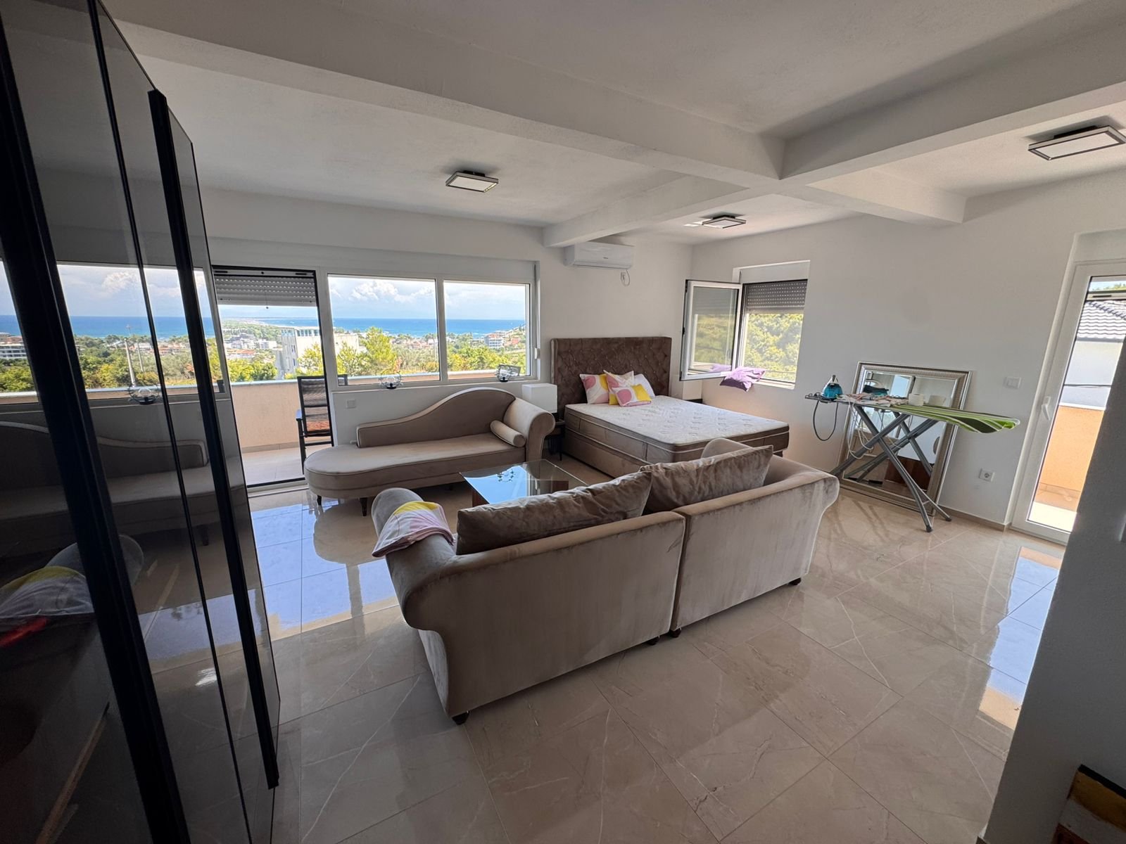 Listings for Rent in Ulcinj: Bright, modern room in Ulcinj, Montenegro with large windows, elegant furnishings&mdash;ideal investment. Discover more at immorenta.me by ekosphere doo.