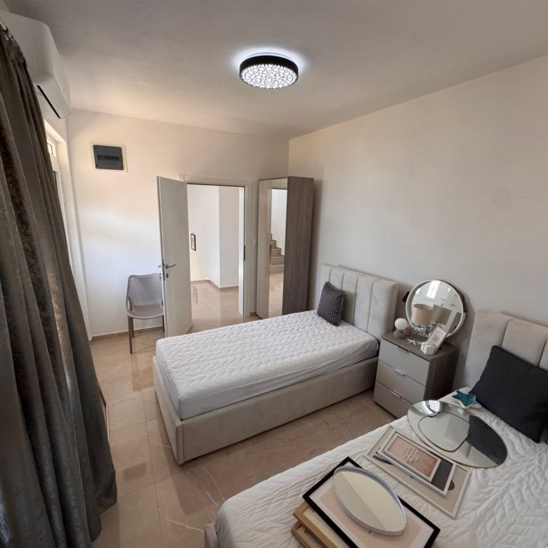 Modern Ulcinj bedroom&mdash;2 single beds, stylish d&eacute;cor, ideal Montenegro real estate investment. Exclusive by immorenta.me/Ekosphere.