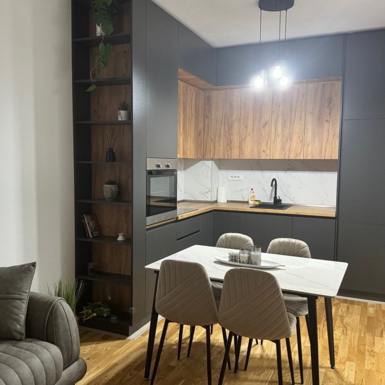 Stunning Ulcinj property features a modern kitchen, marble backsplash, and stylish living area&mdash;exclusive at immorenta.me.