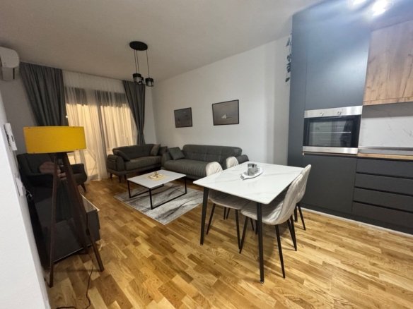 Listings for Rent in Ulcinj: Stylish open-plan Ulcinj apartment with wooden floors, designer kitchen, modern dining and lounge. Prime investment at immorenta.me by ekosphere doo.