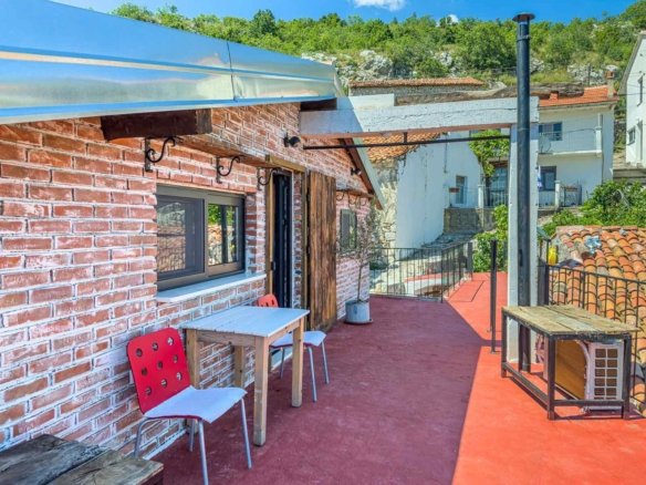Stunning Ulcinj rooftop terrace with red flooring, greenery, city views&mdash;ideal Montenegro investment at immorenta.me by ekosphere doo.