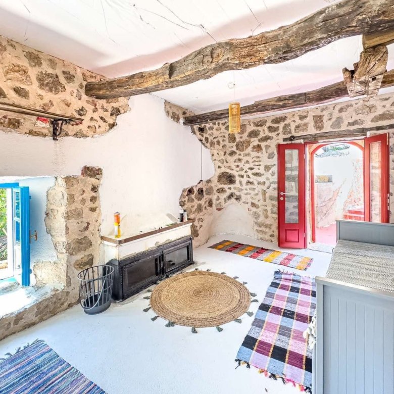 Charming Ulcinj stone house: rustic beams, artisan rugs, stove, and vivid accents&mdash;prime investment from immorenta.me by ekosphere doo.