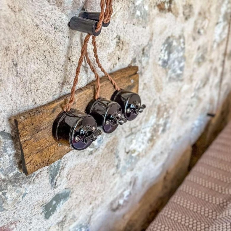 Authentic stone wall with vintage switches showcases Ulcinj charm&mdash;ideal for investment via immorenta.me by ekosphere doo.