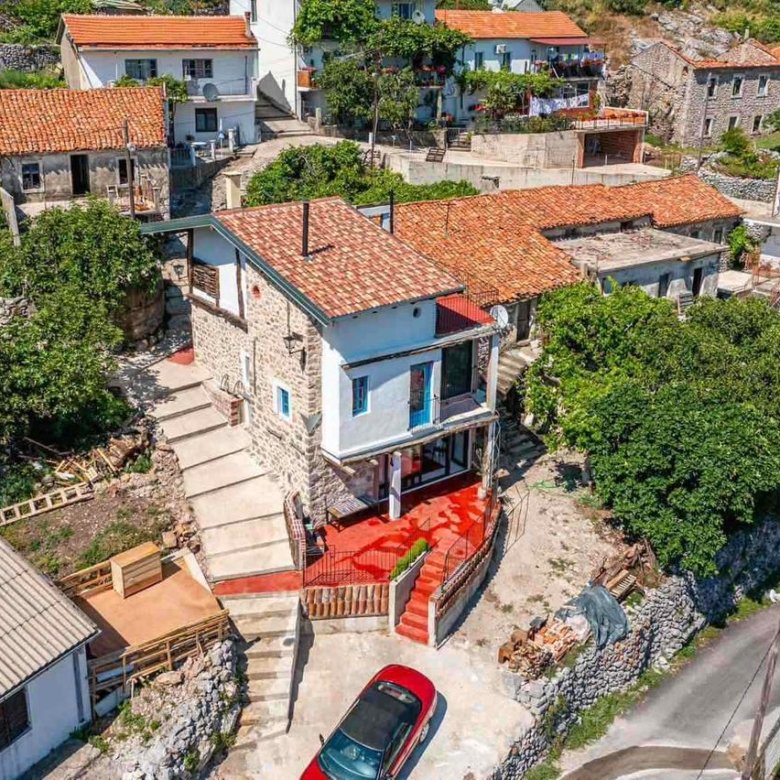 Invest in Ulcinj: Stunning stone house with red-tiled roof, hillside views, and prime location. immorenta.me by ekosphere doo.