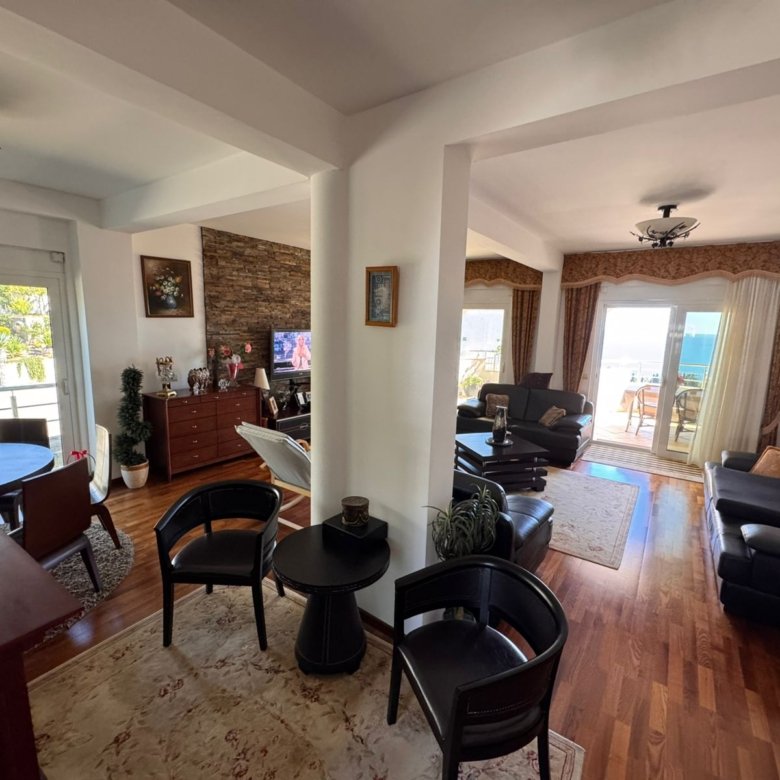 Elegant open-plan living and dining space with sea-view balcony, premium finishes&mdash;ideal Ulcinj investment via immorenta.me by ekosphere doo.