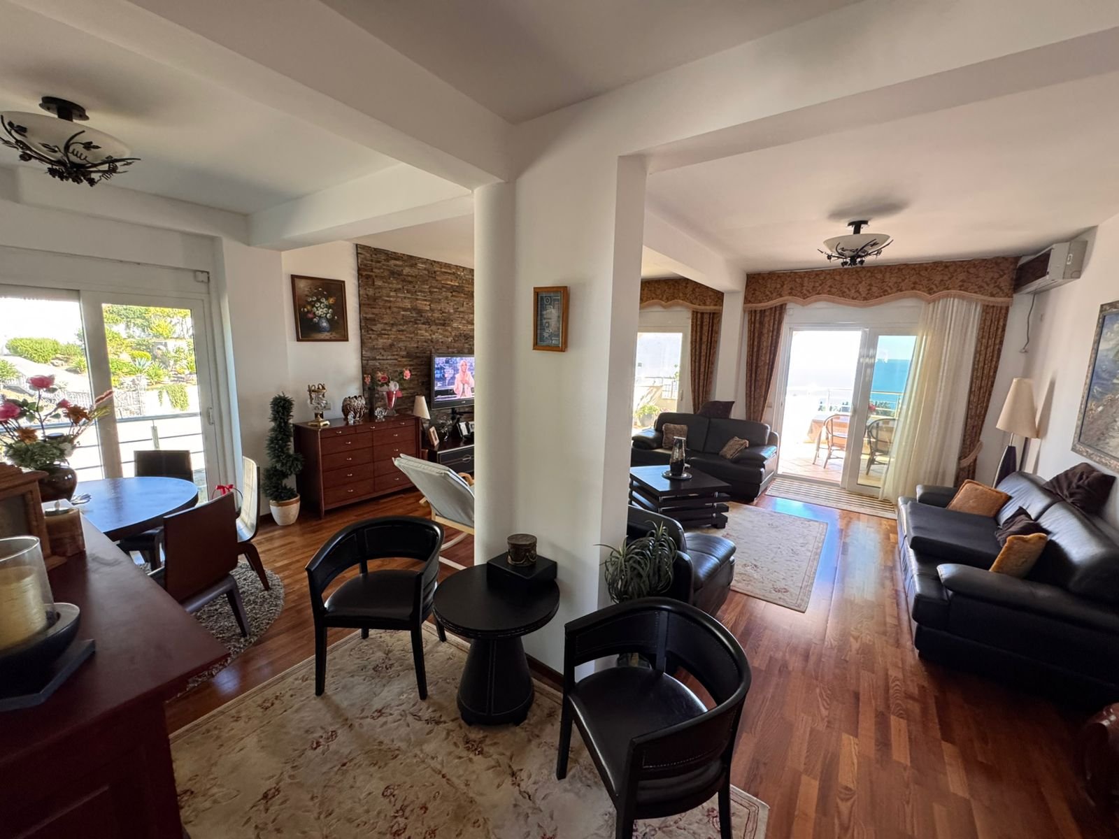 Elegant open-plan living and dining space with sea-view balcony, premium finishes&mdash;ideal Ulcinj investment via immorenta.me by ekosphere doo.