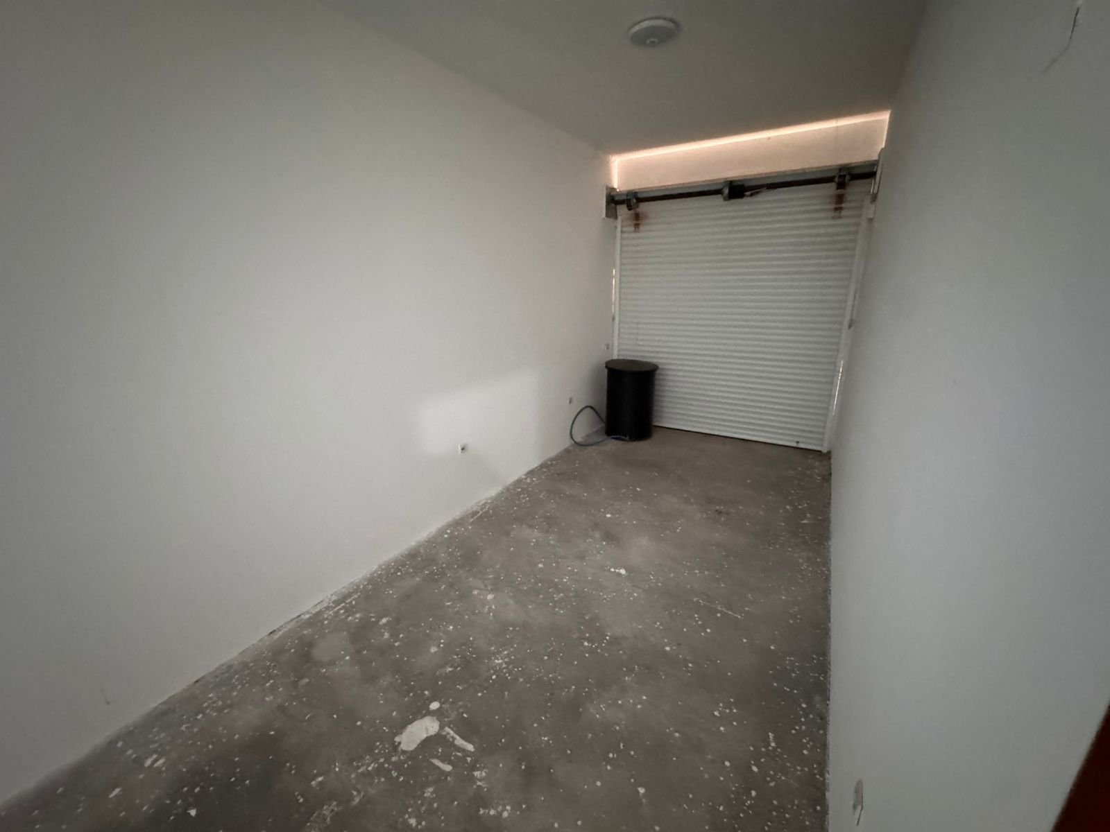 Modern, secure garage in Ulcinj, Montenegro&mdash;ideal investment. Clean, lit space with concrete floor; see more on immorenta.me by ekosphere doo.