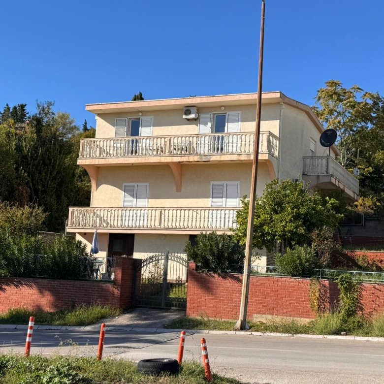Stunning three-story house in Ulcinj, Montenegro. Balconies, lush greenery, ideal investment. See more at immorenta.me.
