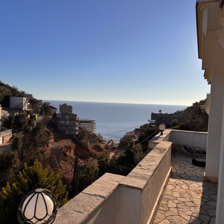 Premium terrace with elegant stone flooring, panoramic sea view, hillside homes, and lush greenery&mdash;ideal Ulcinj investment. Montenegro-listings.me by ekosphere doo.