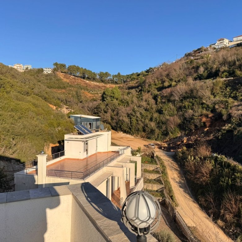 Stunning Ulcinj hillside property with modern homes, lush greenery, and panoramic views&mdash;prime real estate from ekosphere doo.