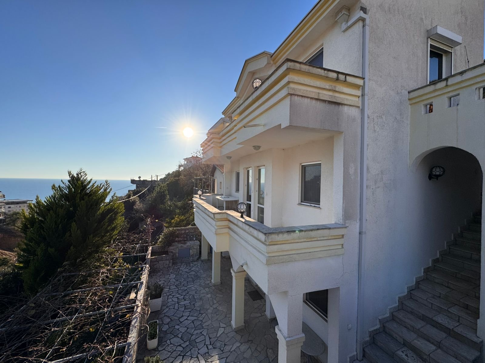 Elegant two-story white villa in Ulcinj with sea views, balconies, stone patio&mdash;prime investment via immorenta.me by ekosphere doo.