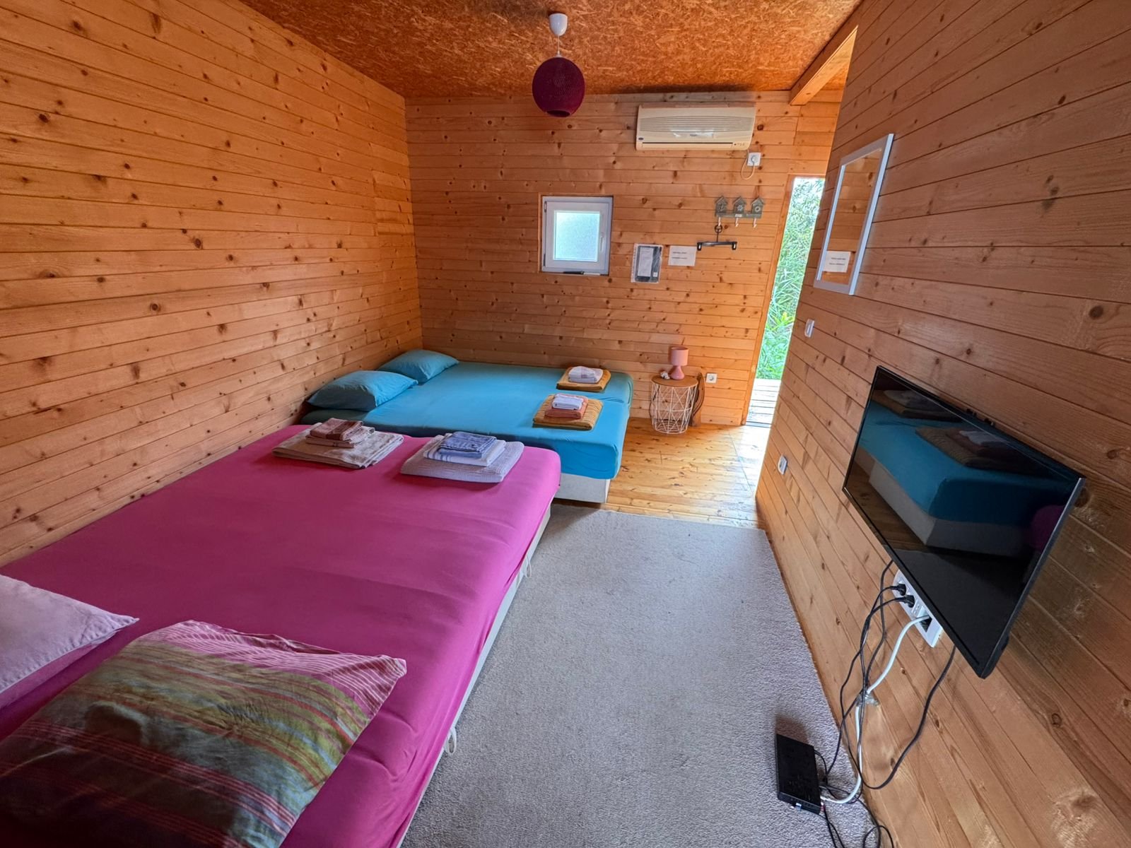 Charming Ulcinj retreat: cozy wooden room, twin beds, A/C, TV. Ideal Montenegro real estate by ekosphere doo&mdash;great investment!.