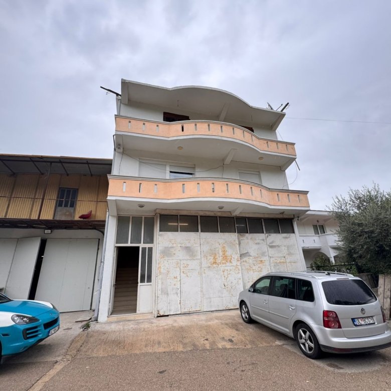 Stunning three-story peach & white building with large balconies in Ulcinj. Prime investment at immorenta.me by ekosphere doo.