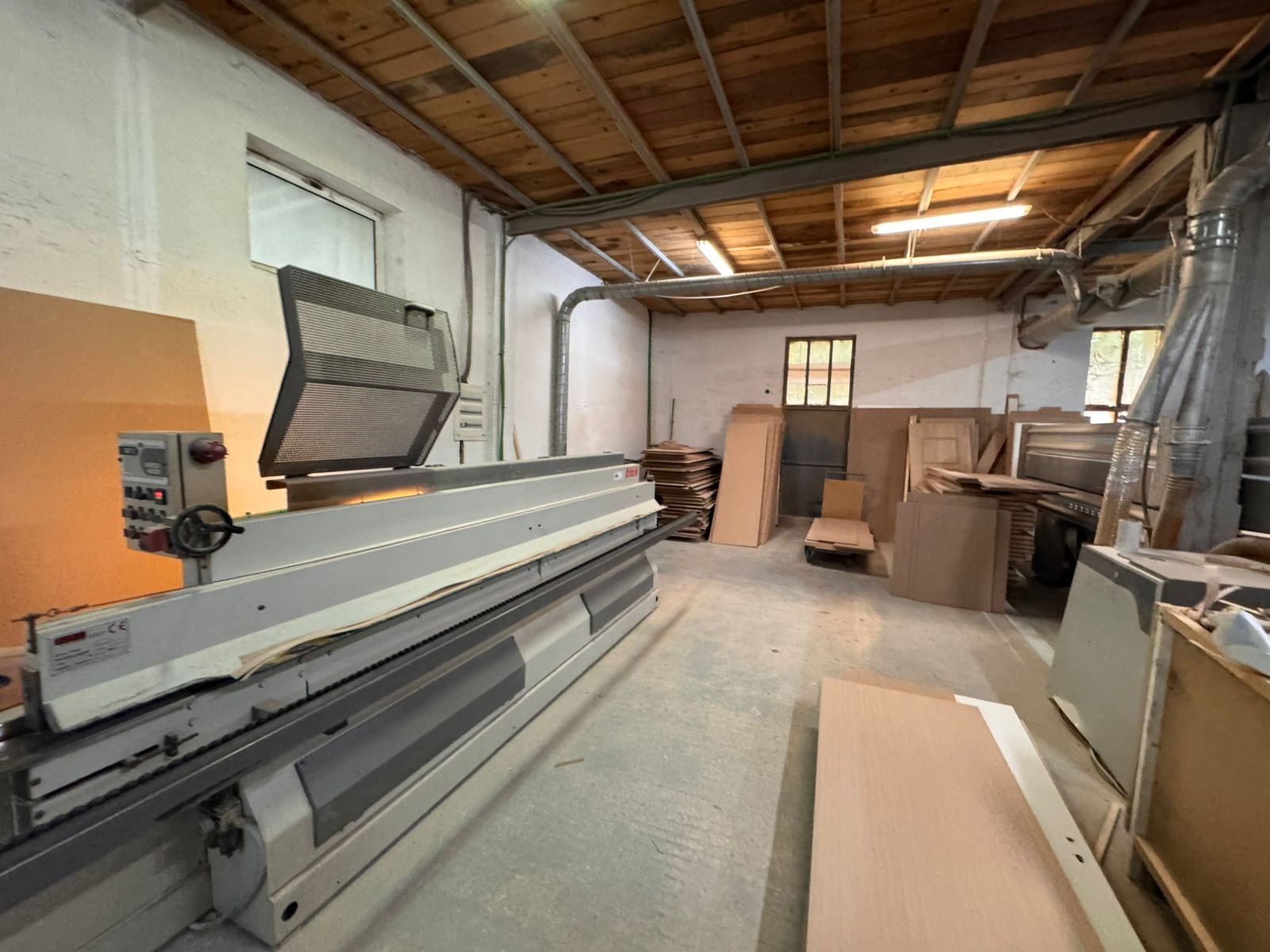 Spacious Ulcinj workshop for sale: prime investment with industrial equipment, ample storage, and wooden ceiling. immorenta.me by ekosphere doo.