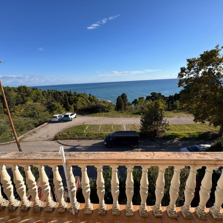 Stunning Ulcinj balcony view with classic white balusters, sea panorama, and Mediterranean scenery&mdash;exclusive at immorenta.me by ekosphere doo.