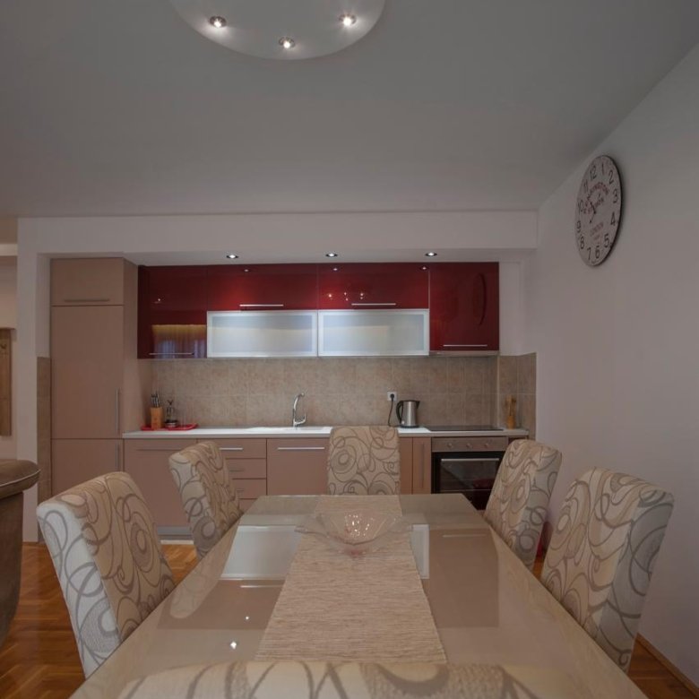 Experience contemporary living in Ulcinj with this stylish kitchen, dining area, upscale finishes&mdash;an exclusive ekosphere doo listing.