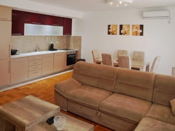 Stunning Ulcinj apartment: open-plan living, modern kitchen, AC, stylish dining&mdash;prime Montenegro property. On immorenta.me by ekosphere doo.