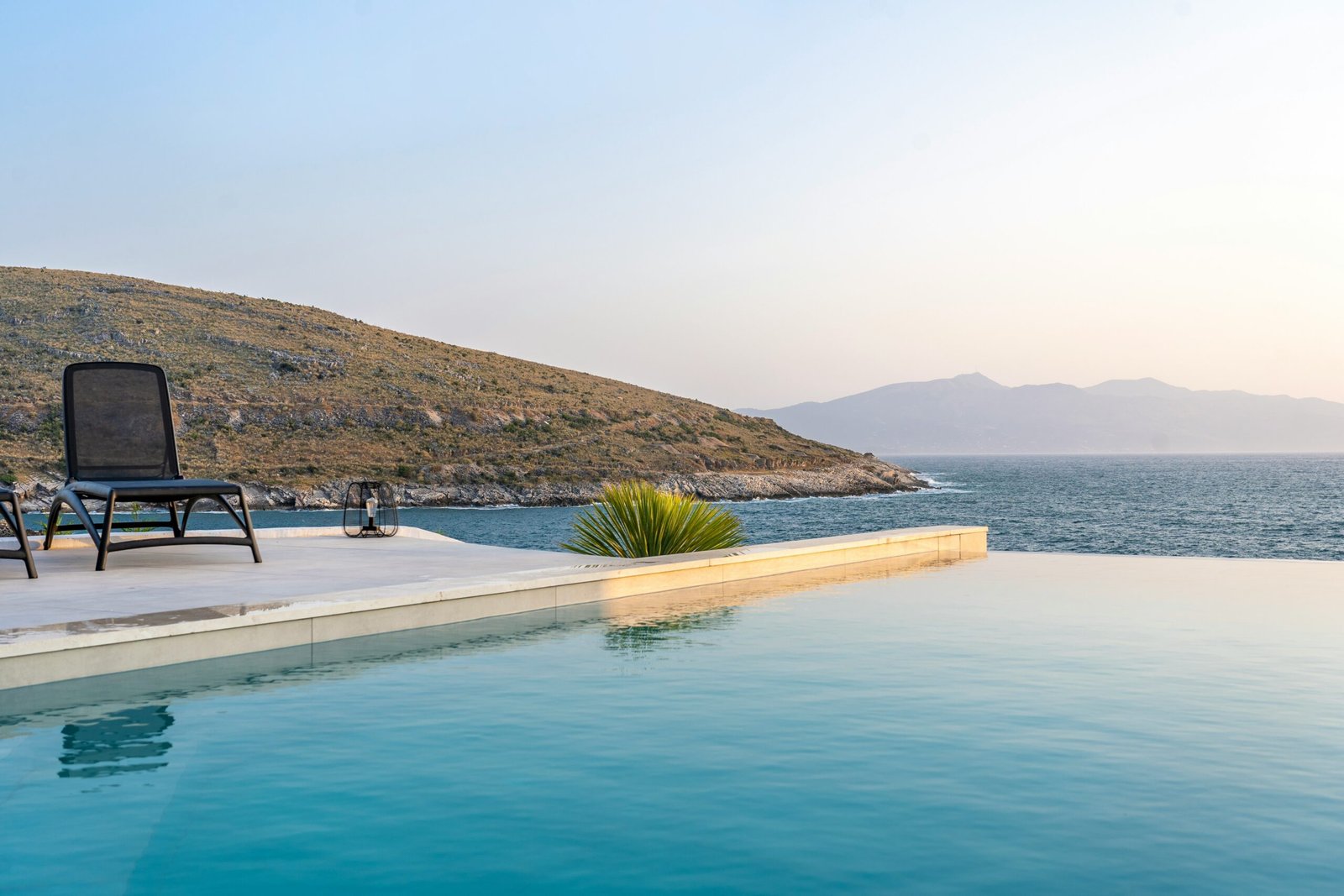 Land Plot for Sale in Ulcinj 13 Land Plot - Experience luxury living in Ulcinj, Montenegro—stunning infinity pool, sea views, mountain backdrop. Invest with immorenta.me by ekosphere doo.