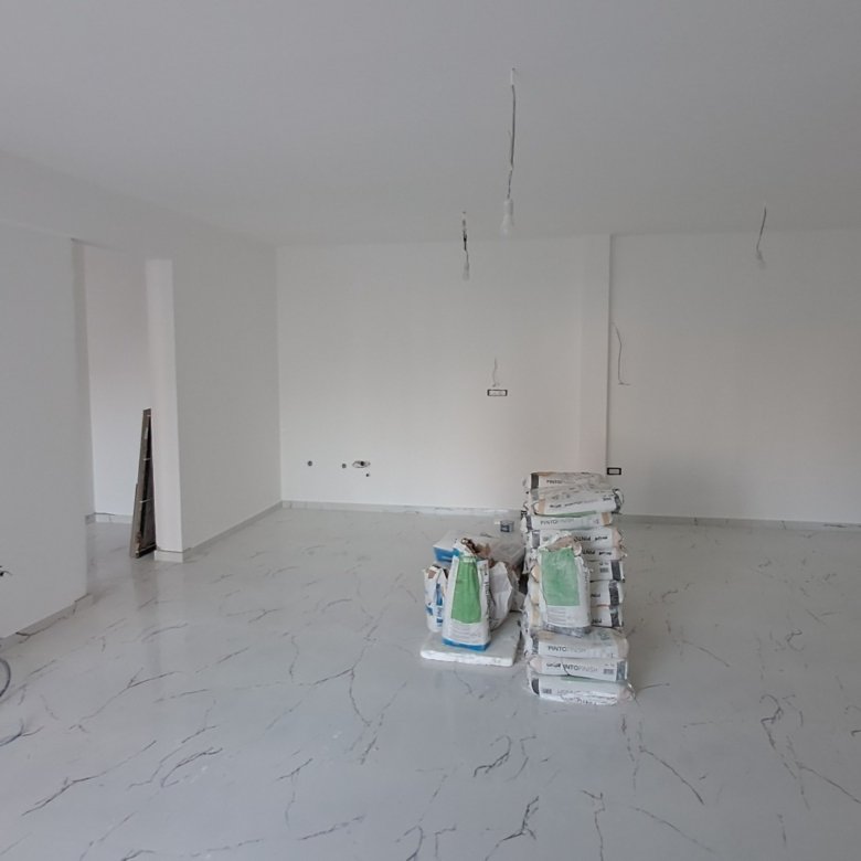 Spacious Ulcinj property under renovation with white walls, stylish flooring, and investment potential&mdash;immorenta.me by ekosphere doo.