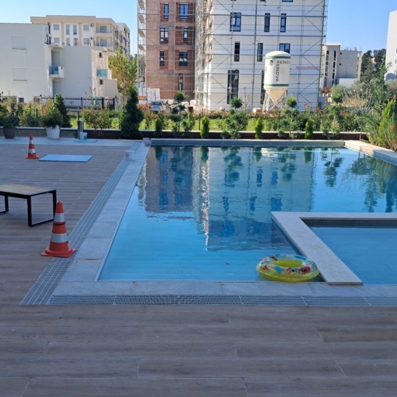 Luxury Ulcinj apartment with pool, elegant deck, seating area; prime Montenegro investment at immorenta.me by ekosphere doo.
