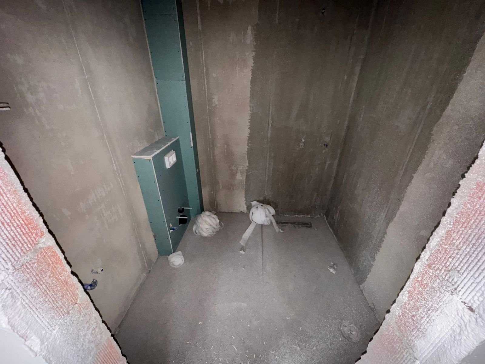 Prime Ulcinj investment: unfinished space with concrete walls, floor, plumbing, and utility setup&mdash;exclusive on immorenta.me by ekosphere doo.