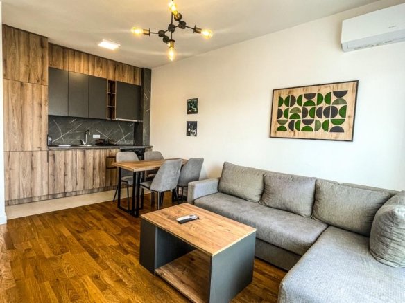 Stylish Ulcinj apartment features a modern living room, premium kitchen, chic dining, and AC&mdash;exclusive at immorenta.me by ekosphere doo.