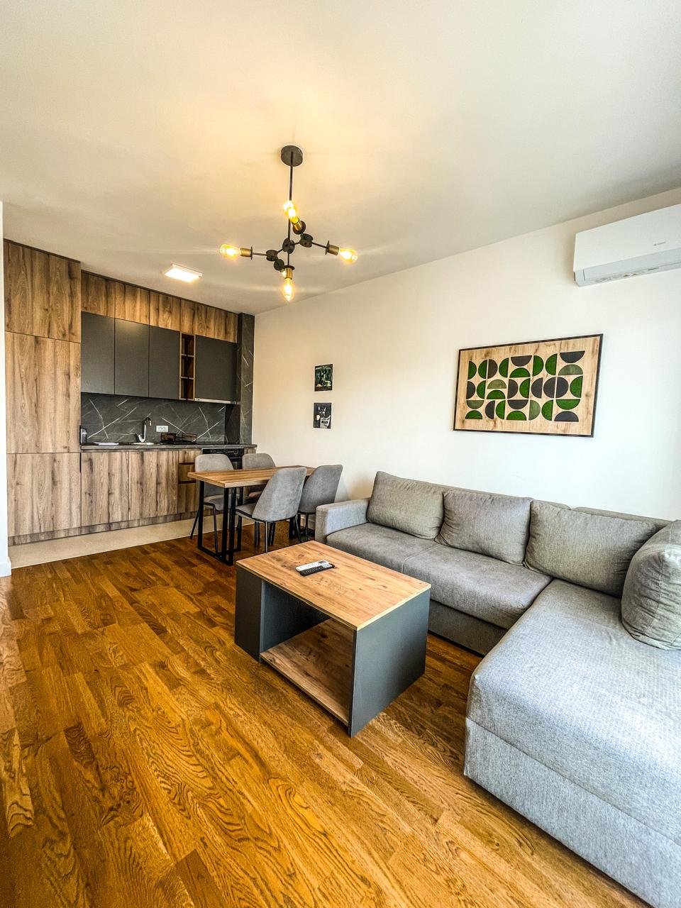 Stylish Ulcinj apartment features a modern living room, premium kitchen, chic dining, and AC&mdash;exclusive at immorenta.me by ekosphere doo.