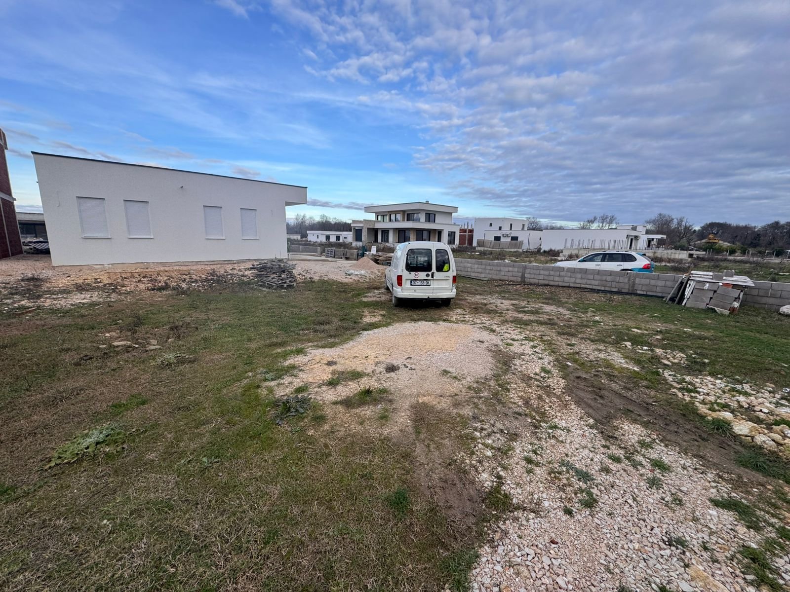 Modern white property for sale in Ulcinj, Montenegro. Prime investment; contemporary homes, easy access&mdash;listed by ekosphere doo.