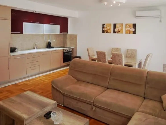 Stunning Ulcinj apartment: open-plan living, modern kitchen, AC, stylish dining&mdash;prime Montenegro property. On immorenta.me by ekosphere doo.